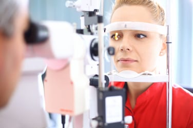 female patience receiving an eye exam