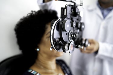 female patient receiving eye exam