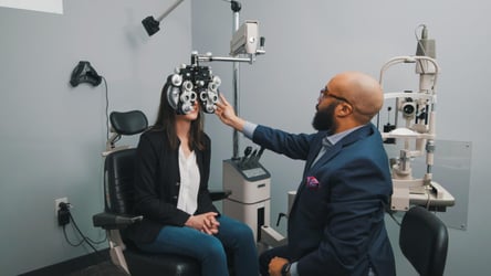 Dr. Darryl Glover, OD performing an eye exam
