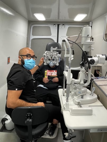 Dr. Glover performing an exam