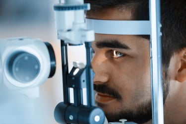 male patient receiving eye exam